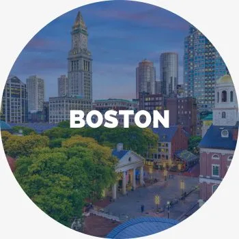 An image of downtown Boston with the word Boston in bold letters